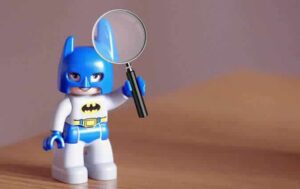 Batman with a magnifying glass