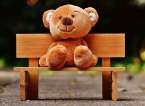 A bear on a bench